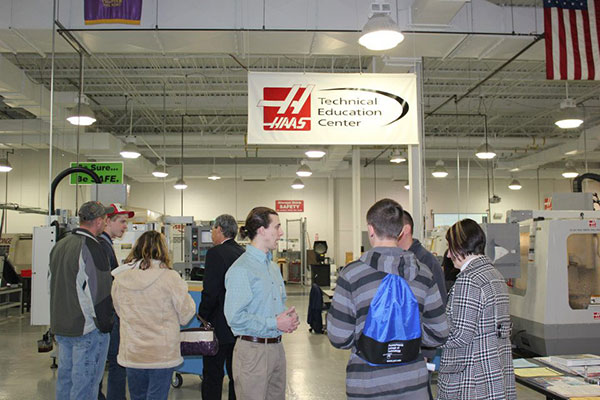 Thaddeus J. Temple, a 2009 alumnus of the manufacturing engineering technology major, lends a hand in College Avenue Labs.