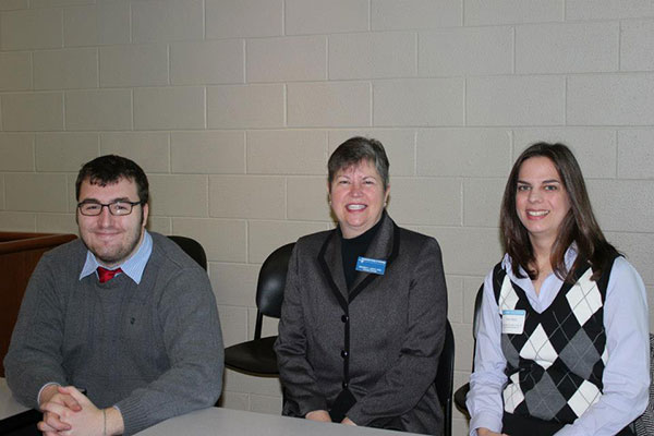 Alumna Erin E. Odell, '02 and '09 (right), returned to campus to aid Rhonda L. Davis, assistant professor, and Jack T. Foister, a legal assistant-paralegal studies major from Home.