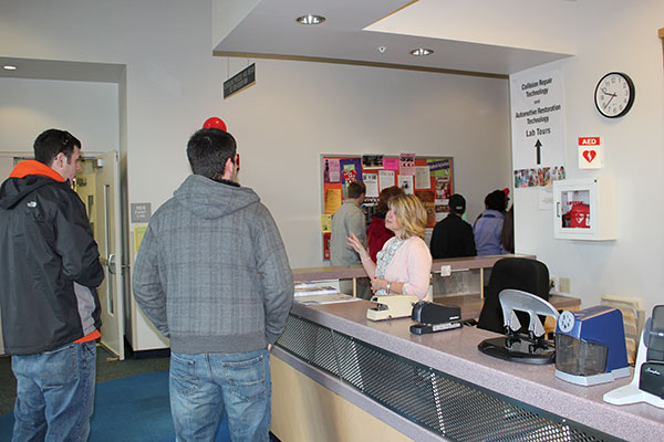 Stacey E. Hampton, coordinator of matriculation and retention for the School of Industrial and Engineering Technologies, guides visitors through the intricate layout of College Avenue Labs.