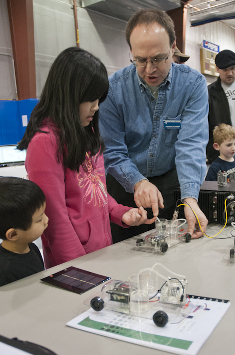 Christopher H. Van Stavoren, assistant professor of automotive, shows how hydrogen fuel cells work to power vehicles.
