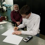 Ryan A. Gibson is judged by Gary S. Giacobbi, associate professor of aviation.