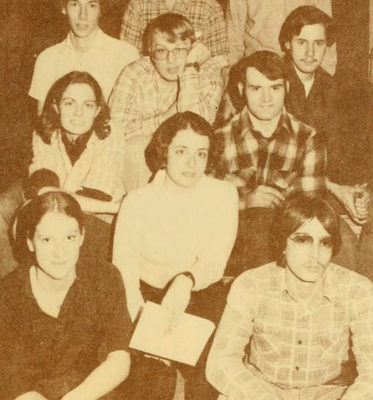 The Drama Club adviser, identified only as "J. Taylor" and seated front row-center, is surrounded by her cast and crew as they rehearse a 1981 production of "Barefoot in the Park."