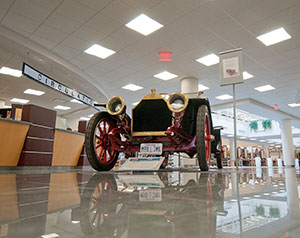 A 1909 Chalmers-Detroit roadster, on display in Penn College’s Madigan Library, will be a focal point for an April 26 discussion of the college’s automotive restoration technology major.