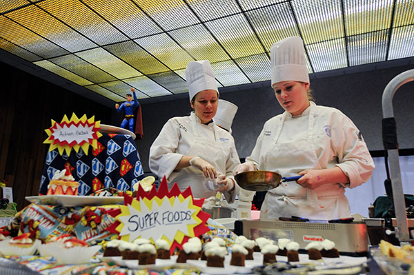 Candice E. Fowler and Katelyn A. Dellinger prepare their super-healthy “Super Foods.”