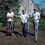 From left, Nathan A. Regan, Rachael E. Stafford and Nicholas D. Foreman clean up a Way's Garden bed in preparation for spring planting.