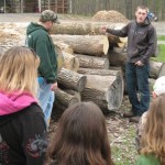 Kyle A. Gibson (left), of Jersey Shore, and Michael A. Kocjancic, of Kane, discuss log-scaling and tree measurement.