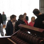 Wade S. Truitt, of McAllisterville, and Zachary L. Yetter, of Thompsontown (not shown), walk students through the sawmilling process.