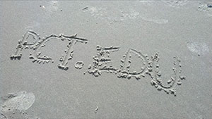 Students' sandy signature will wash away, but not their indelible mark on storm-ravaged communities.