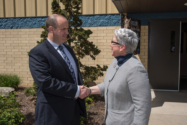 President Davie Jane Gilmour welcomes Penn State football coach Bill O'Brien to campus.