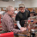 Bruce A. Emig talks one-on-one with a student in this 2010 photo.
