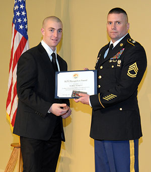 Cadet Matthew Testagrose, of Shoreham, N.Y. (left) is presented with an American Veterans Association Award by Sgt. 1st Class John Warnock, of Bloomsburg University.