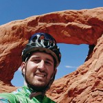 Jared B. Houseknecht stands before sandstone grandeur in Utah's Arches National Park