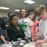 Chef Sue Major, assistant professor of baking and pastry arts/culinary arts, demonstrates a cupcake-decorating project.