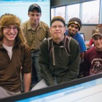 John J. Messer, center, assistant professor of Web and interactive media, with students