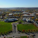This expansive view encompasses the main campus entrance (flanked by the Madigan Library and the Student and Administrative Services Center), the surrounding community of which Penn College is a vital part, and the natural beauty of the river and foothills that add to the institution's perennial attractiveness.