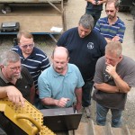 Caterpillar's Dan Johnson works with several secondary instructors at the Schneebeli Earth Science Center near Allenwood.