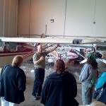 Walter V. Gower, assistant professor of aviation, outlines the fleet of aircraft available for student instruction.