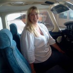 Classified employee Shawnalee E. Miller at the controls