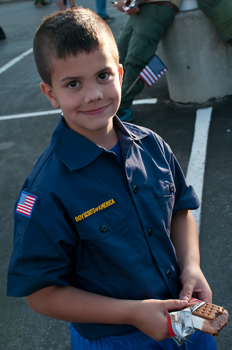 At the end of a long march, a Cub Scout savors his reward.