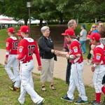 President Gilmour greets Canada's entry during a campus cookout for the 2012 Little League Baseball World Series teams.
