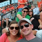 Penn College alumni have some photo fun in the stands. Clockwise from foreground are Zachary A. Sites (2006, electronics technology); his fiancee, Laurel Monaghan; Josh F. Davis (2007, business administration:management concentration); and his fiancee, 2008 health information technology graduate Kaila E. Gruver.