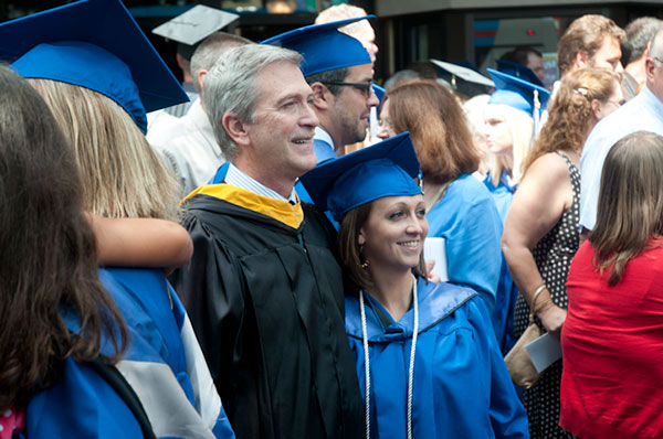 Robert Slothus, director of radiography, poses with a new graduate.