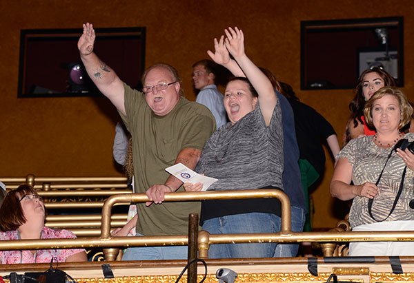 The celebration spreads to the venue's upper reaches.