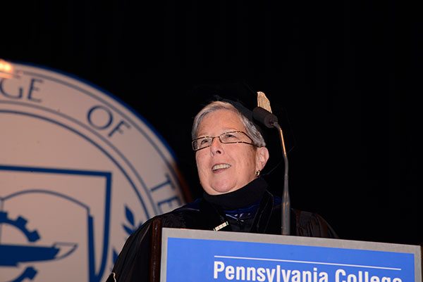 President Davie A. Gilmour welcomes graduates and guests to the Community Arts Center.