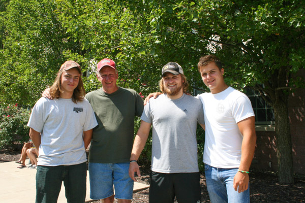 Appropriately standing near the trees of Lancaster Hall are three freshmen enrolled in forest technology: Aaron J. Andrews, of White Haven; Aaron's father, William Andrews; William's grandson, Zachary W. Taylor, of Dallas, and Justin D. Brobst, Dallas. (Yes you read that right, William brought his son and his grandson to college Saturday. Despite their similar ages, Aaron is an uncle to Zachary.) Zachary says Penn College was at the top of the list when he Googled 