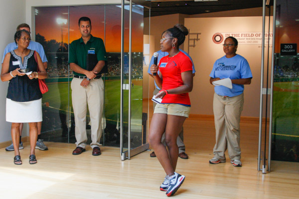 ... joined by Kacie L. Weaver, president of the Multicultural Society and a Resident Assistant, prior to viewing the gallery's  Little League photography exhibit, 