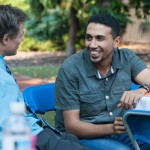 Hashim A. Alfulful, from Saudi Arabia, a freshman enrolled in English as a Second Language, shares a laugh with Timothy J. Mallery, assistant director of residence life.