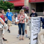 Sarah R. Shott, an admissions representative and Penn College alumna, engages students and their parents as another tour forms outside the Hager Lifelong Education Center.