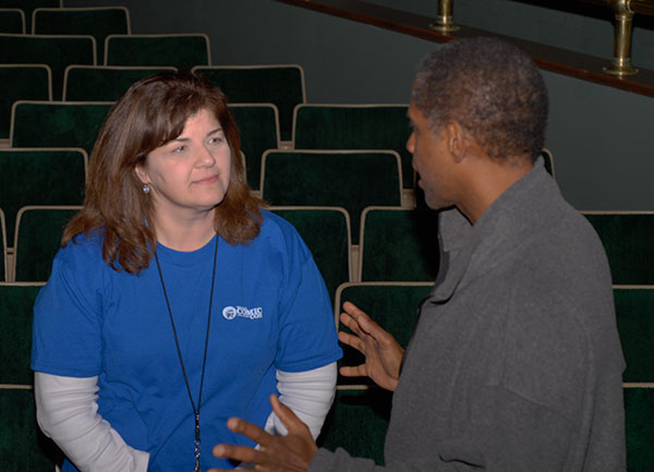 Tim Russ talks with Jean M. Bremigen, Madigan Library's operations/public services manager, who arranged for presenters' travel to Williamsport.