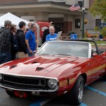 Penn College students and faculty get a look at a 1969 Shelby GT500 Mustang convertible, with drag pack, owned by local collector and businessman Ronald Paulhamus.