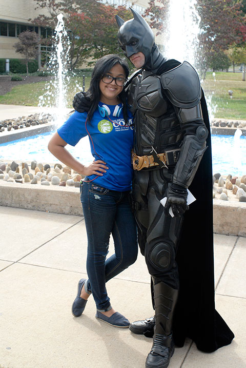 Batman (from Heroes 4 Higher) shares a moment with general studies major/Wildcat Comic Con volunteer Arianny D. Vizcaino, of Williamsport.