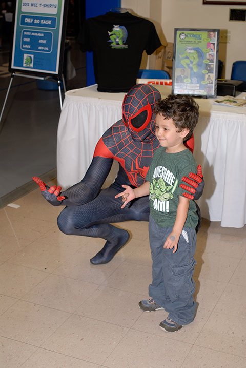 Spider-Man takes time out in the Field House to show the proper way to sling a clingy web.