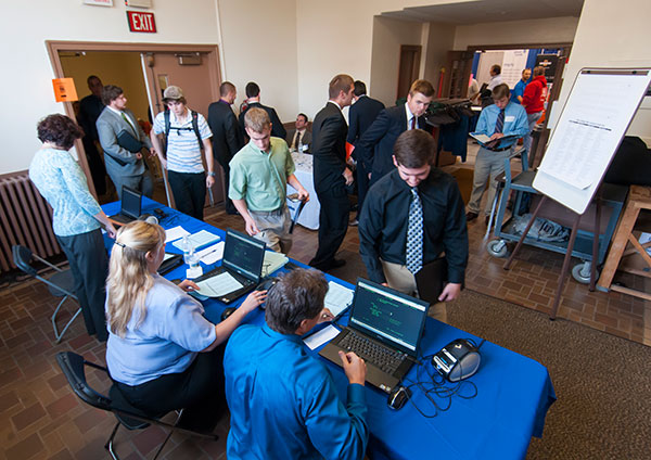 Students check in at Bardo Gym before entering the vendor area.