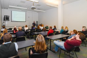 Conference attendees fill a room in College Avenue Labs to hear a presentation on the sociology of violence by Andrew R. Wilczack, assistant professor of sociology from Wilkes University.