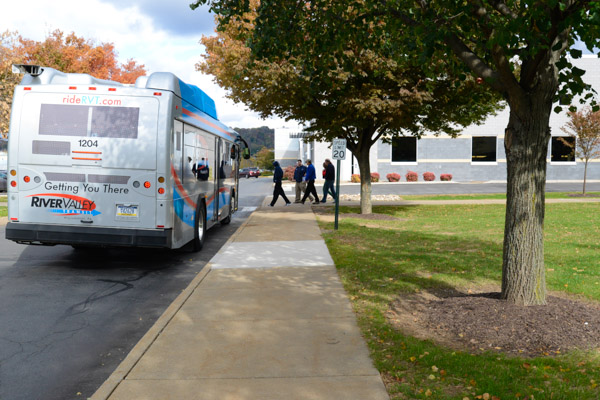 By bus and by foot, visitors trek around campus.
