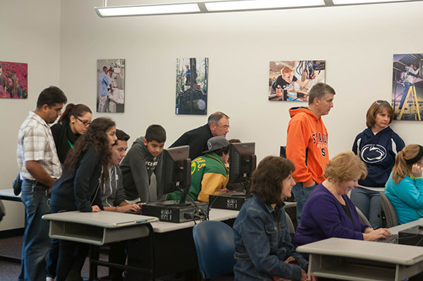 With the Admissions Office waiving the $50 application fee Sunday, many families applied online in the Academic Services and First Year Programs lab.