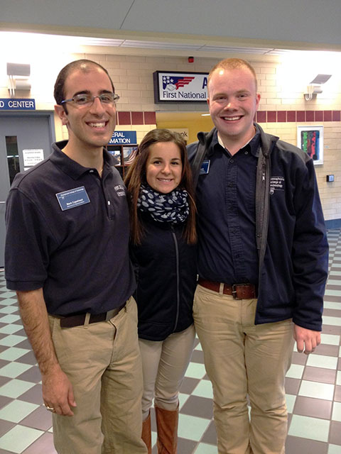 A pleasant and united front in the Campus Center: Admissions representative Mark R. Capellazzi (left), a 2009 culinary arts and systems alum, with Ambassadors Ashley G. Maietta and Trevor I. Brandt. 
