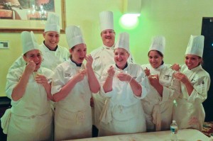 At State College magazine’s Chefs on Stage fundraiser, Penn College students and faculty sample the sabayon with fresh berries they served to help support the Centre County Child Access Center. They are, from left: Victoria L. Kostecki, Center Valley; Theodore J. Persing, South Williamsport; Katlyn J. Hackling, Lake Hiawatha, N.J.; Chef Paul Mach, assistant professor of hospitality management/culinary arts; Lisa R. Aunkst, Watsontown; Alyssa J. Morales, Reading; and Amber S. English, Lewistown.