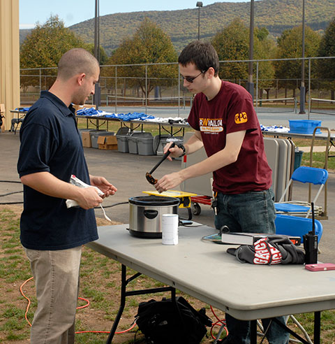 Among Chili Cook-Off competitors is Ryan M. Egan, a pre-emergency medical services student from Levittown.