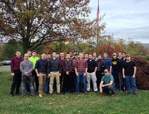 Members of the Service and Operation of Heavy Equipment student organization (advised by Ryan W. Peck, instructor of diesel equipment technology) greeted employers and carried their boxes to the ESC tables.