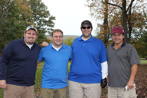 From left: Joshua D. Wilson, a 2011 accounting grad; Nathan E. Pish, part-time member of the mathematics faculty; Chad M. Chervinsky, who also earned an accounting degree in 2011; and Joe Nededog, assistant professor of business administration, management and marketing came to play ...