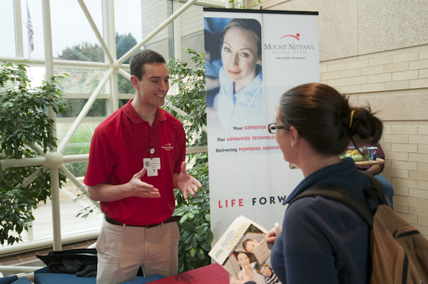 Drew Brungard, HR recruiter for Mount Nittany Medical Center, discusses job openings with a student.