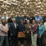 Alumni, faculty and retirees gather for a group photo at an afternoon reception. At center is George P. Wolfe, who implemented not only the first computer curriculum at the college but also the Technology Transfer Center, now known as Workforce Development & Continuing Education. 
