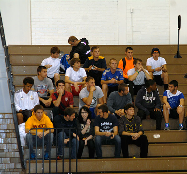 The Wildcat men's soccer team turns out in support of the women's volleyball team during 