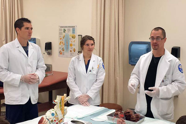 Francis W. Spear, Ashlee E. Frontz and Donald Wieder are among the juniors in the Physician Assistant Program who held a workshop that gave visiting high school students a glimpse into what the PA profession is all about.