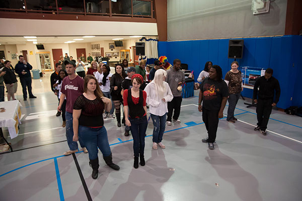 Karaoke and dancing add to the night's entertainment on the busy Field House floor.